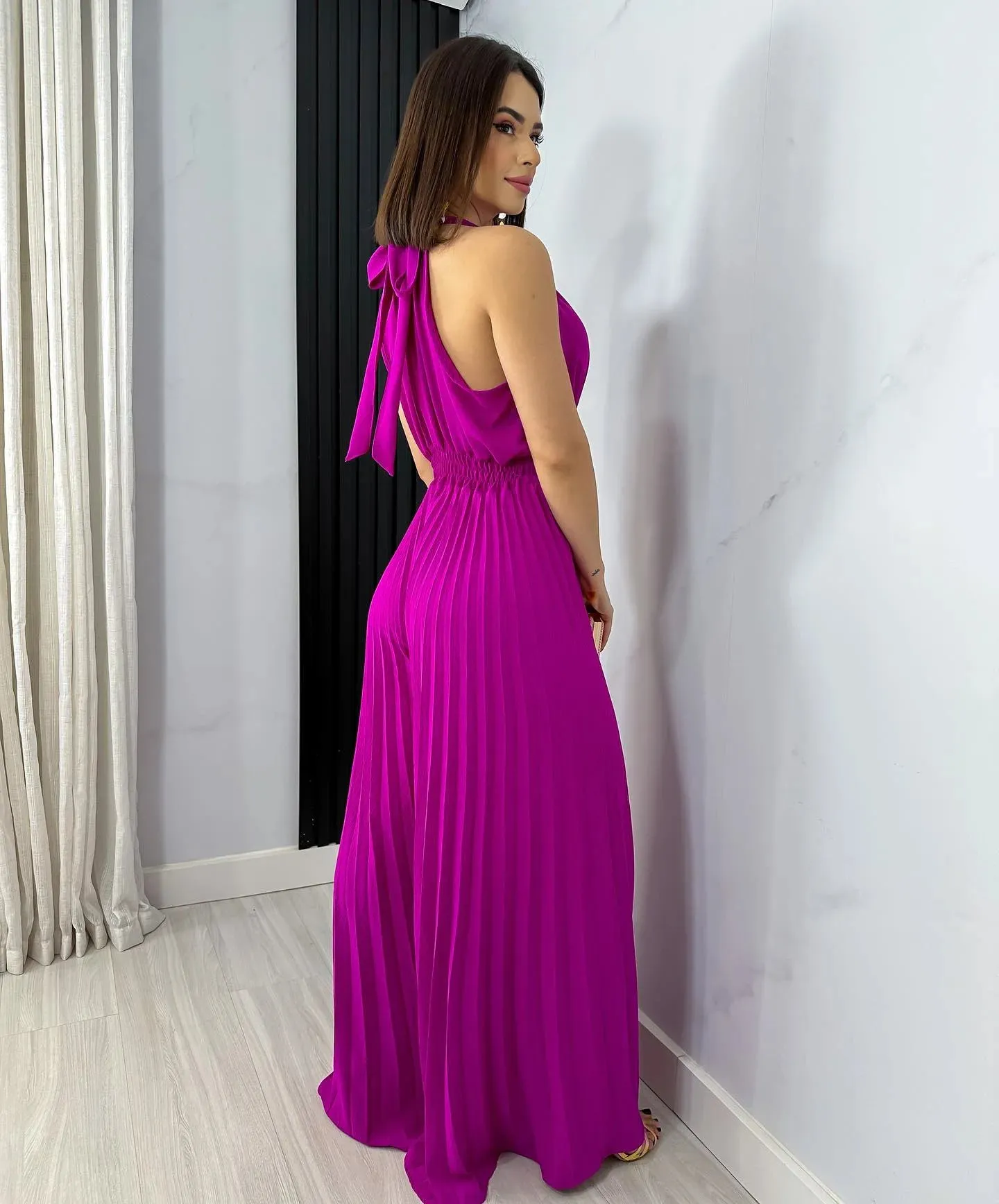 Sleek Pleated Halter Flared Leg Jumpsuit